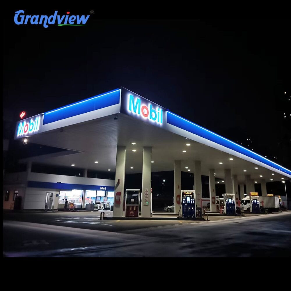 Illuminated LED gas station canopy fascia factory design featuring Mobil branding at night