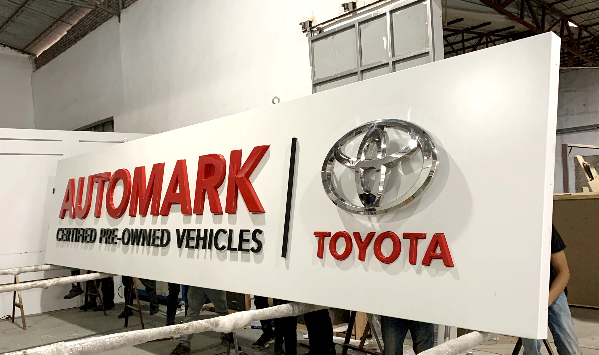 Acrylic face panel with vinyl graphics for Automark certified pre-owned vehicles
