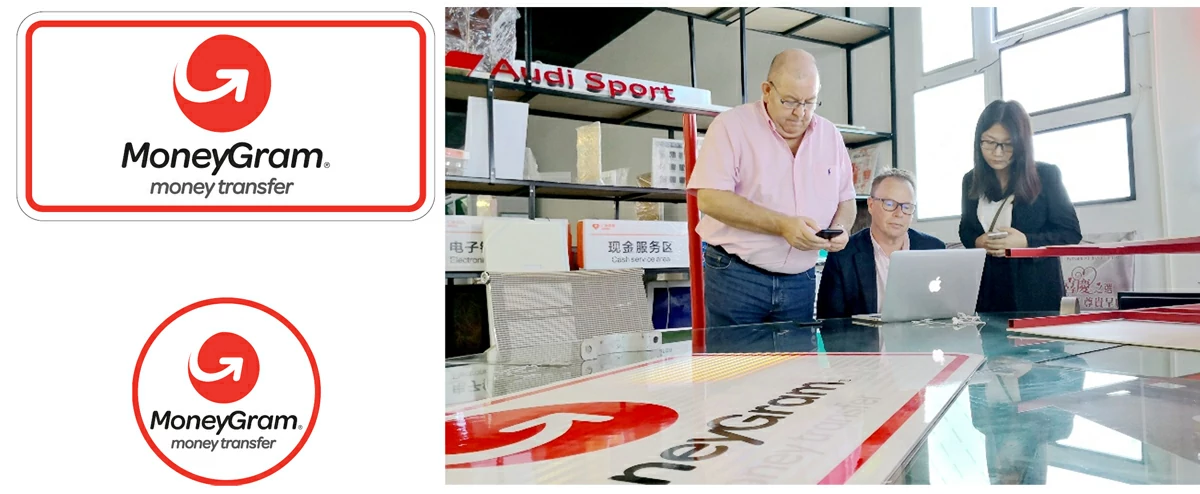 Grandview team discussing technical design for custom retail signage project