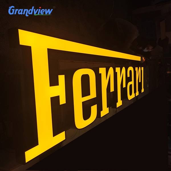 Custom 3D LED lighted letter factory product featuring bright yellow Ferrari brand logo