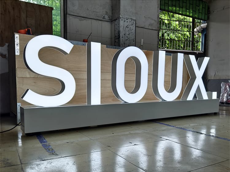 Large 3D freestanding architectural letters for outdoor corporate monument signage