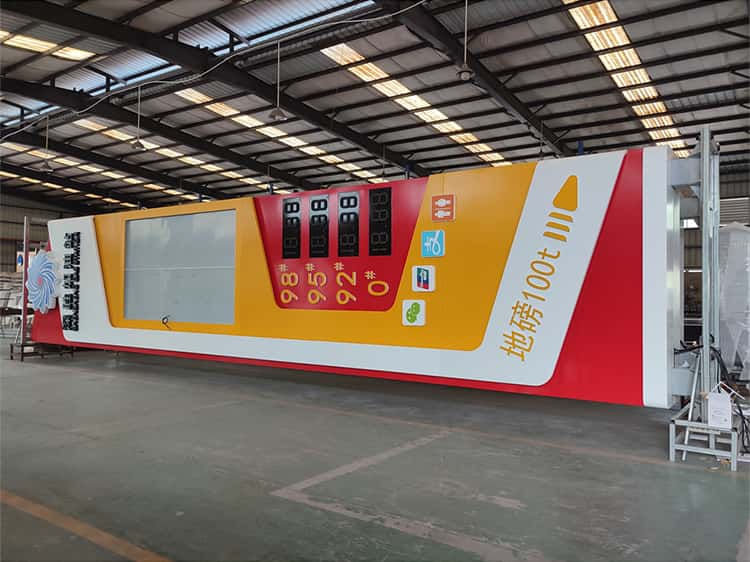 Large freestanding gas station pylon sign
