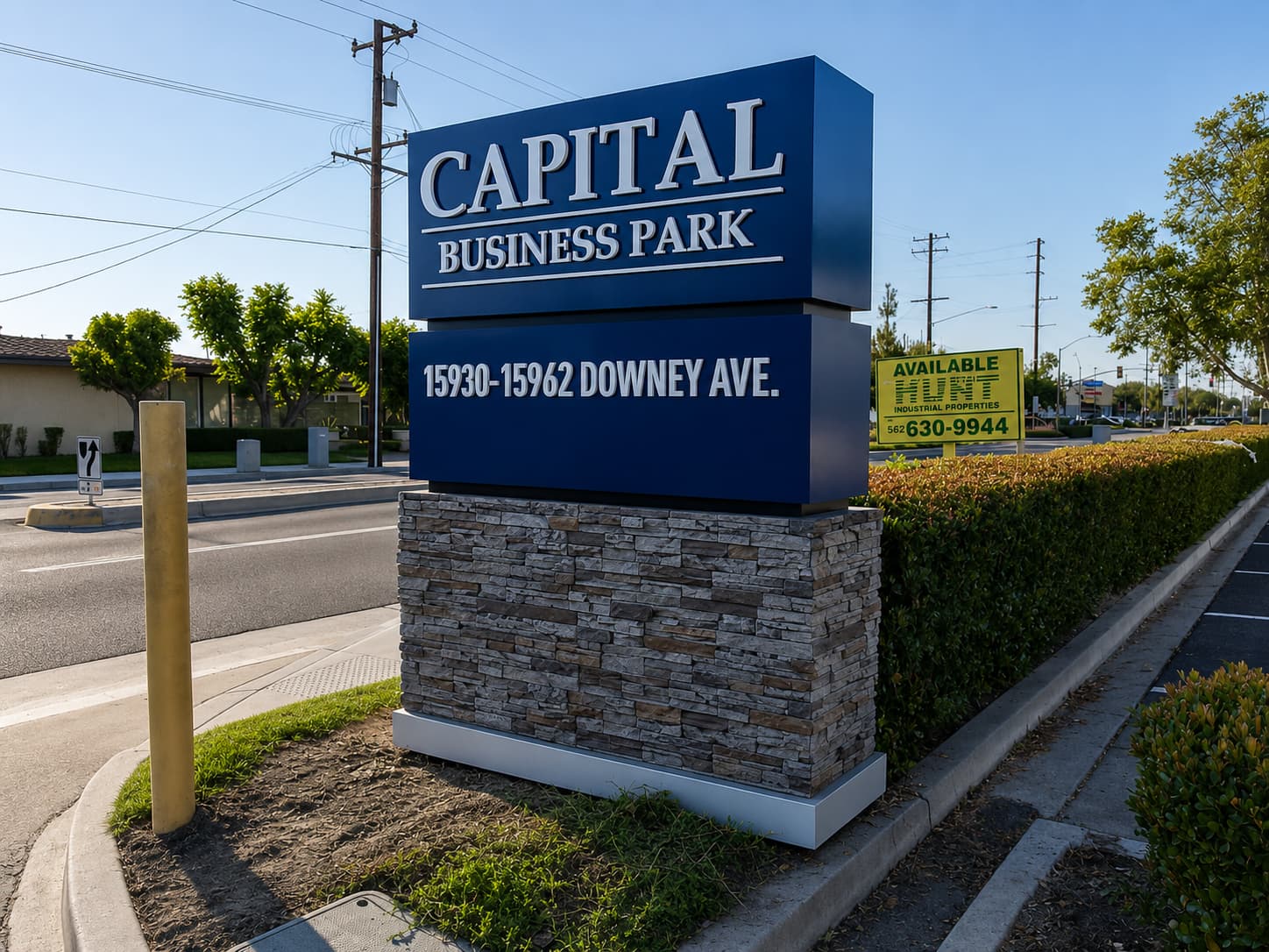 Monument and totem sign used as an entrance identity marker
