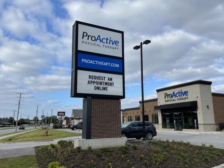 A completed commercial pylon sign should be reviewed in relation to the road, entrance, surrounding buildings, and viewing direction.